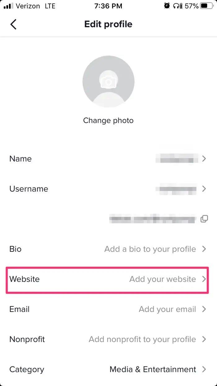 Screenshot of TikTok Edit profile screen with the website field highlighted.